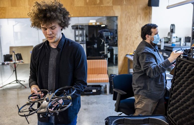 Binc CEO Blake Resnick holds a Lemur drone at Brinc in Seattle on May 11, 2022.