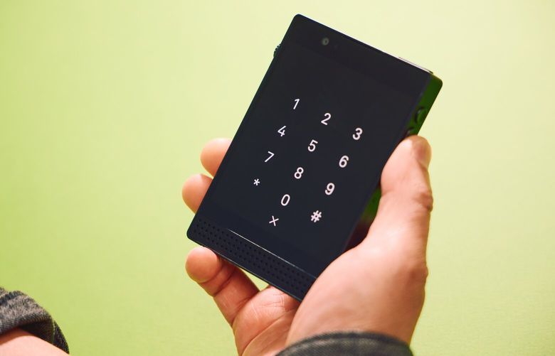 The Light Phone III is more simple than a smart phone, but comes with a built-in camera. (Andria Lo/The New York Times)