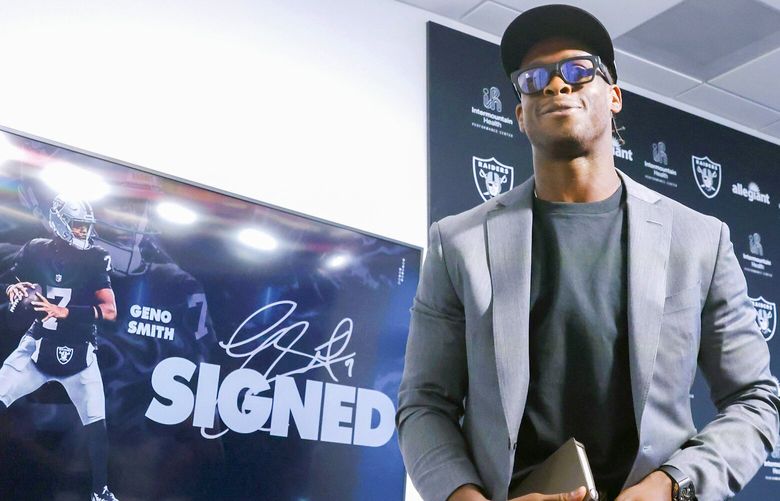 Geno Smith leaves the podium after being introduced to the  media as new Raiders quarterback, April 7, 2025, Henderson, Nev. (Bizuayehu Tesfaye / Las Vegas Review-Journal via AP)