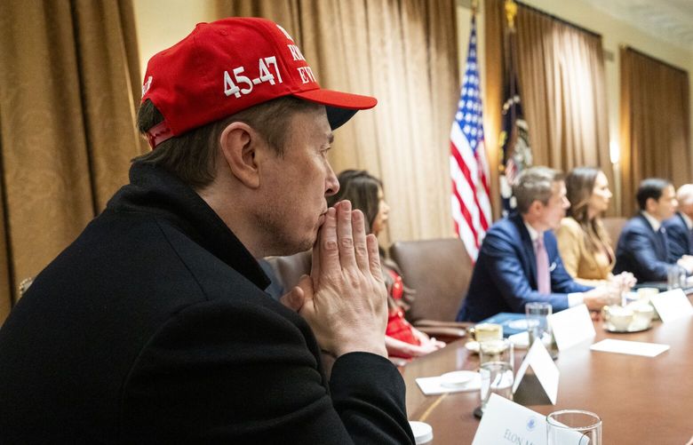 Elon Musk listens as President Donald Trump delivers remarks during a Cabinet meeting in the Cabinet Room of the White House in Washington, on Monday, March 24, 2025. Musk, the Republican megadonor, said early Friday that he would be going to Wisconsin, apparently to campaign for the conservative candidate in a high-profile judicial contest. (Doug Mills/The New York Times) XNYT0678 XNYT0678