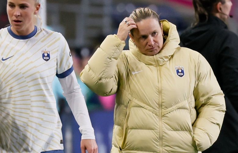 Seattle Reign FC head coach Laura Harvey watches play from the sidelines during the second half Saturday, March 15, 2025 in Seattle. 229494