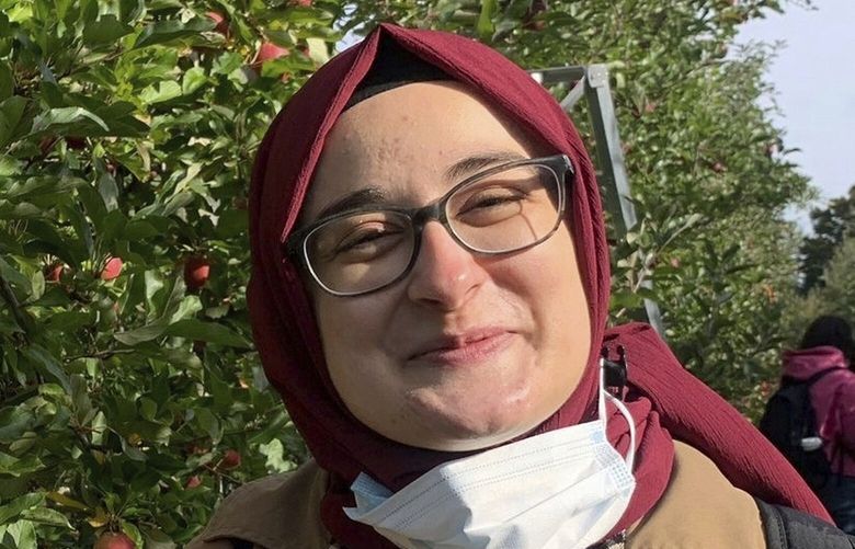 FILE-  This contributed photo shows Rumeysa Ozturk on an apple-picking trip in 2021. (AP Photo) NYDD217 NYDD217