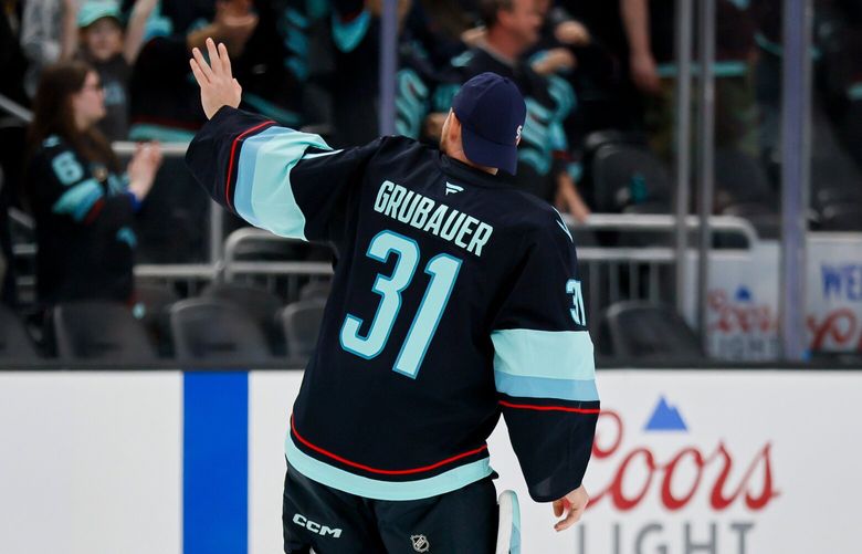 Seattle Kraken goaltender Philipp Grubauer waves good-bye to fans after the final game of the season Tuesday, April 15, 2025 in Seattle. 229668