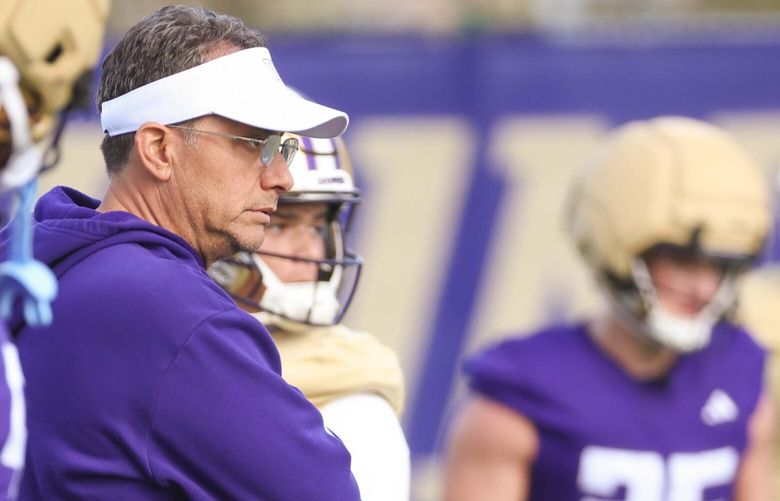 Washington Huskies head coach Jedd Fisch observes practice at Husky Stadium in Seattle on Thursday, April 3, 2025. 

 229660