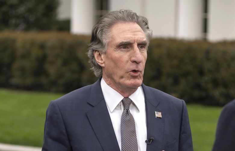 Interior Secretary Doug Burgum speaks with a reporter outside the West Wing of the White House, Thursday, April 10, 2025, in Washington. (AP Photo/Mark Schiefelbein) DCMS114 DCMS114