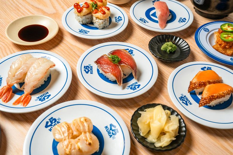 Kura Revolving Sushi Bar expands to Lynnwood, offering customers 100 different sushi, dumplings and tempura plates on the conveyor belt that wraps around all the dining tables. (Luciano Picazo)