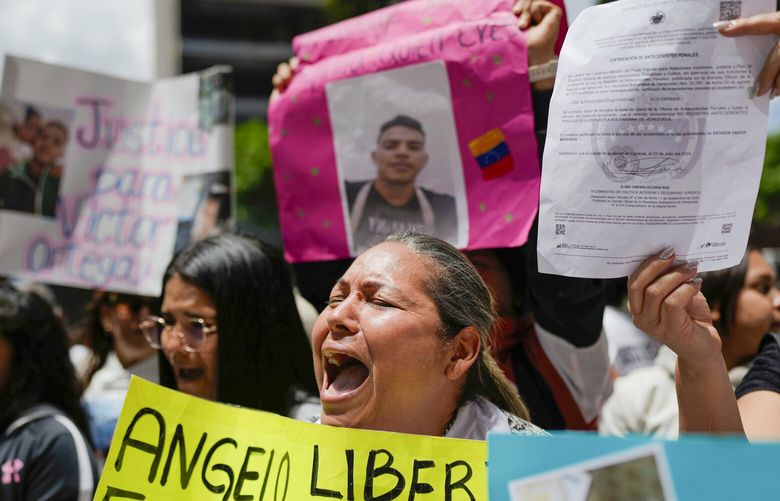 The relatives of Venezuelan migrants in the U.S. who were flown to a prison in El Salvador by the U.S. government who alleged they were members of the Tren de Aragua gang, protest outside of the United Nations building in Caracas, Venezuela, Wednesday, April 9, 2025.