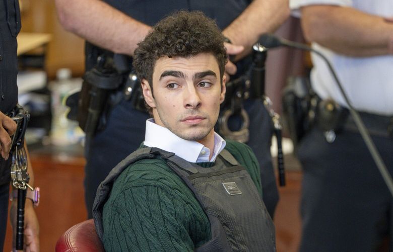 FILE – Luigi Mangione , accused of fatally shooting the UnitedHealthcare CEO Brian Thompson in New York City, appears in court for a hearing, Friday, Feb. 21, 2025, in New York. (Steven Hirsch/New York Post via AP, Pool, File) CARV306 CARV306