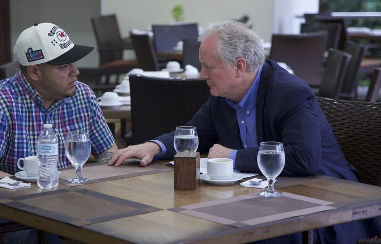 Maryland Sen. Chris Van Hollen, right, speaks with Kilmar Abrego Garcia, a Salvadoran citizen who was living in Maryland and deported to El Salvador by the Trump administration, in a hotel restaurant in San Salvador, El Salvador, Thursday, April 17, 2025. (Press Office Senator Van Hollen, via AP) MXEV110 MXEV110