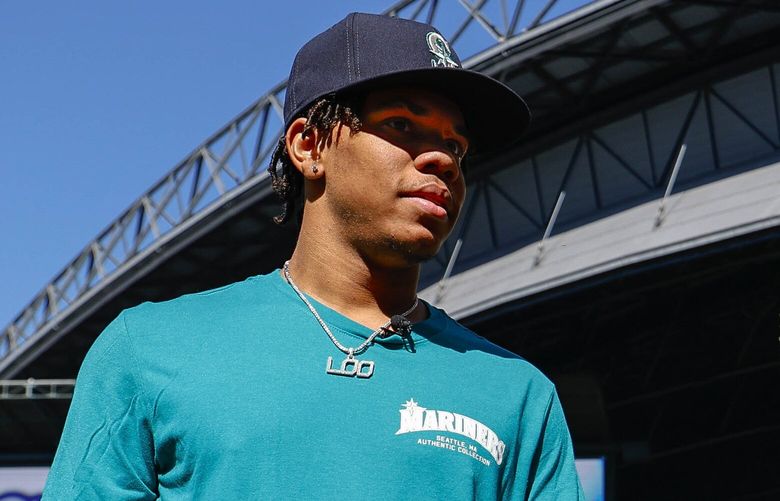 The Mariners two new draft picks, Jurrangelo Cijntje, left, and Ryan Sloan were on hand to meet their potential teammates at T-Mobile Park Tuesday.. The Los Angeles Angels played the Seattle Mariners in Major League Baseball Tuesday, July 23, 2024 at T-Mobile Park, in Seattle, WA. 227480