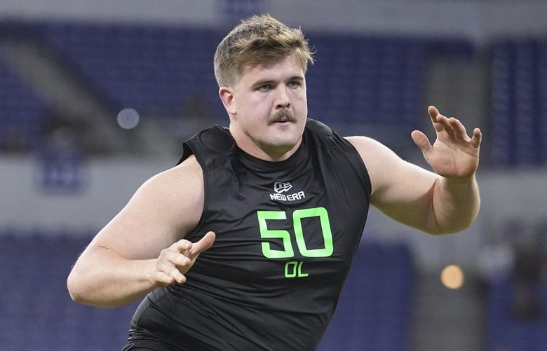 North Dakota State offensive lineman Grey Zabel runs a drill at the NFL football scouting combine in Indianapolis, Sunday, March 2, 2025. (AP Photo/Michael Conroy)