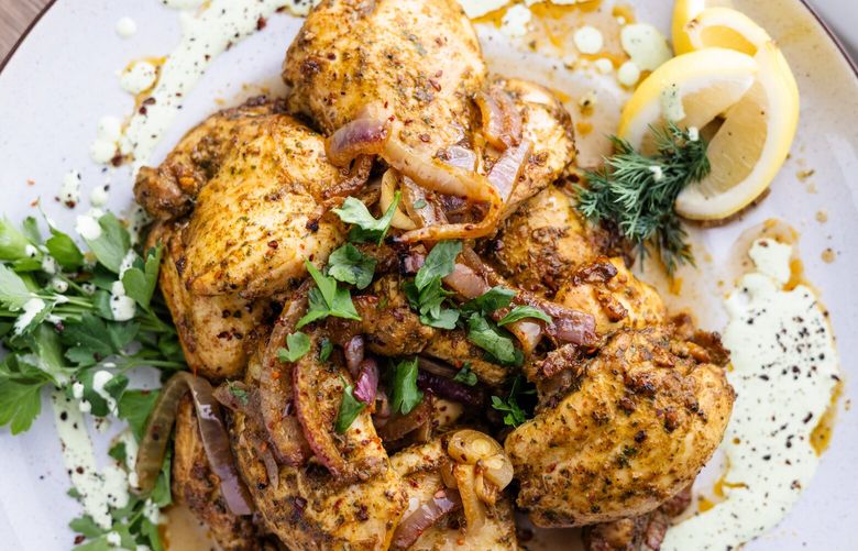 This shawarma-style sheet pan chicken is a quick and easy meal that you can scale up and make for a crowd, or throw together quickly at the end of the night.