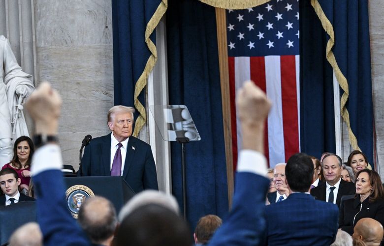 Attendees cheer as President Donald Trump speaks after taking the oath of office during the 60th Presidential Inauguration in the Rotunda of the U.S. Capitol in Washington, Monday, Jan. 20, 2025. (Kenny Holston / The New York Times via AP, Pool)