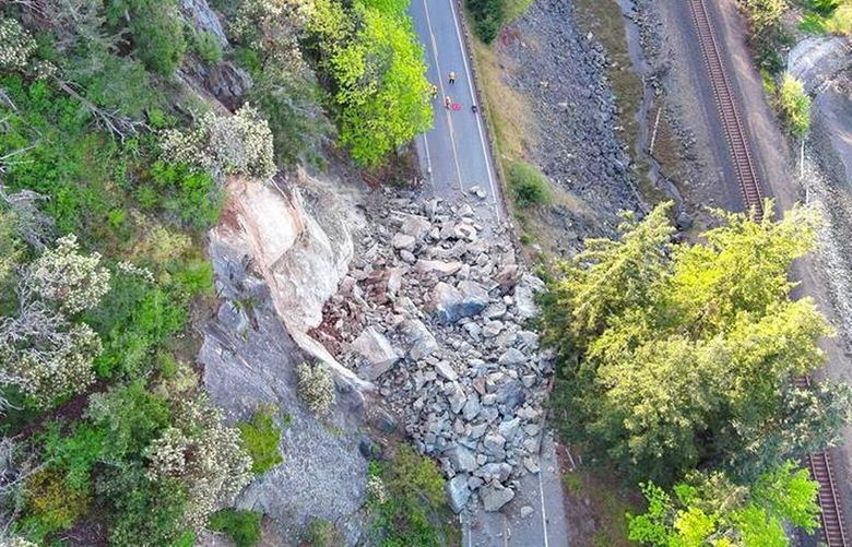 Chuckanut Drive remains fully closed until further notice due to a rockslide. Geotechs were on site today examining the active slide area.