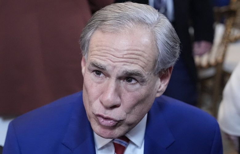 FILE – Texas Gov. Greg Abbott talks in the East Room of the White House, Feb. 5, 2025, in Washington. (AP Photo/Alex Brandon, file) NYPS217 NYPS217