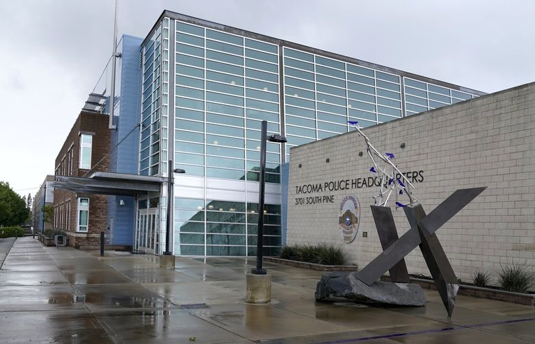 The headquarters for the Tacoma Police Department is shown Thursday, May 27, 2021, in Tacoma, Wash., south of Seattle. The Washington state attorney general charged two Tacoma police officers with murder and another with manslaughter in the death of Manuel Ellis, a Black man who died after repeatedly telling officers he couldn’t breathe as he was being restrained on March 3, 2020, in Tacoma. (AP Photo/Ted S. Warren)