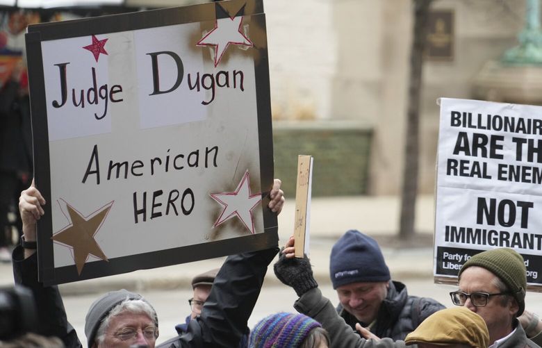 Supporters of Judge Hannah Dugan hold a rally in Milwaukee at the U.S. Courthouse in Milwaukee on Friday, April 25, 2025. (Lee Matz/Milwaukee Independent via AP) WIMIN508 WIMIN508