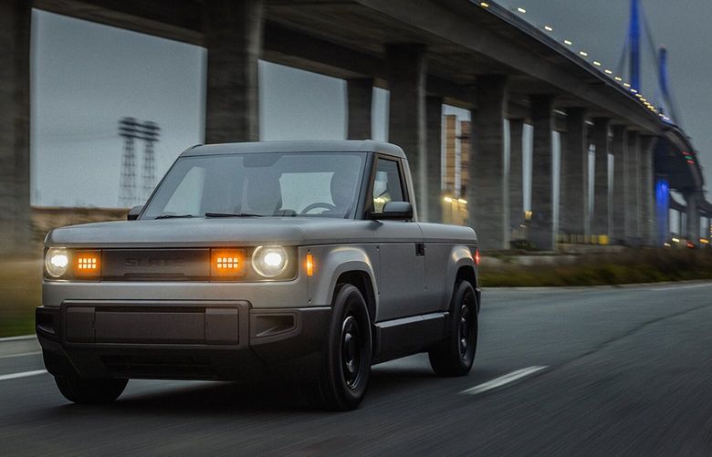 The Slate Truck, to be sold for $20,000 without power windows or touchscreens, is backed by former Amazon executives Jeff Bezos and Jeff Wilke.