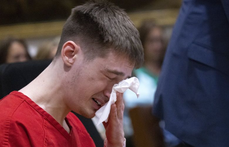 Chase Jones, who is too emotional to read the speech he wrote to the families of his victims, cries as his attorney Brad Barshis gets up to read his words. Jones pleaded guilty to killing four people in a crash near Renton and was sentenced to 210 months in prison at the Maleng Regional Justice Center in Kent Friday, April 25, 2025. Judge Mark Larrañaga’s is presiding. 229887