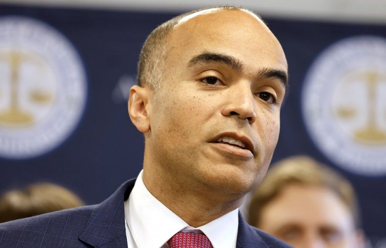 Attorney General Nick Brown announces a new lawsuit against the federal government over its order to cut federal funding for gender-affirming care for trans youth at a press conference in Seattle on Friday, February 6, 2025. Trump signed that executive order last week.