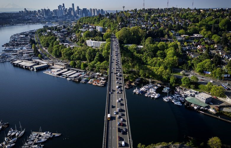 Traffic heading into downtown Seattle during the morning commute backs up on the Aurora bridge, Thursday, April 24, 2025. Drive-alone and transit trips are on the rise into downtown Seattle.