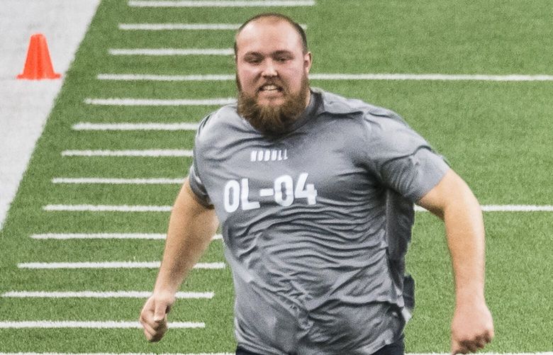 Kansas’ Bryce Cabeldue runs a drill during the Big 12 Conference’s NFL football pro day Wednesday, March 19, 2025, in Frisco, Texas. (AP Photo/Jessica Tobias)