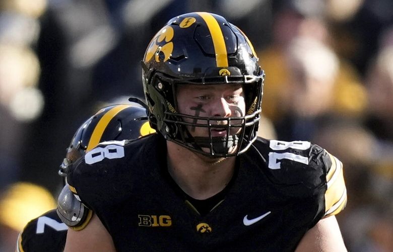 Iowa offensive lineman Mason Richman (78) looks to make a block during the first half of an NCAA college football game against Northwestern, Saturday, Oct. 26, 2024, in Iowa City, Iowa. (AP Photo/Charlie Neibergall)