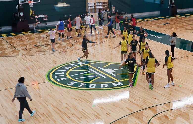 The Seattle Storm high-five each other during a scrimmage on the first day of training camp Sunday, April 28, 2024 in Seattle. 226704