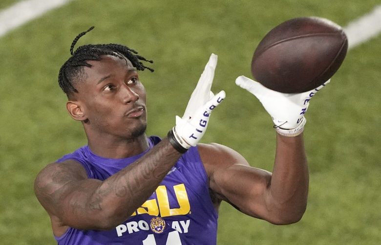 LSU cornerback Zy Alexander (14) runs through drills during the school’s NFL football pro day in Baton Rouge, La., Wednesday, March 26, 2025. (AP Photo/Gerald Herbert)