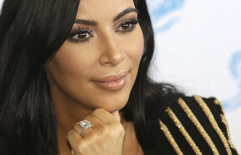 FILE – Kim Kardashian attends the Cannes Lions 2015, International Advertising Festival in Cannes, southern France, on June 24, 2015. (AP Photo/Lionel Cironneau, File) XPAR102 XPAR102