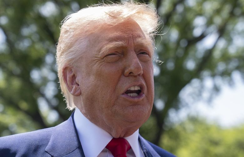 President Donald Trump speaks to reporters as he leaves the White House en route to attend a rally in Macomb County, Mich., to mark the 100th day of his second term in office, Tuesday, April 29, 2025, in Washington. (AP Photo/Manuel Balce Ceneta) DCMC111 DCMC111