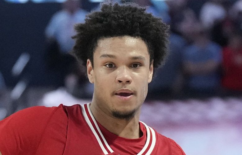 Houston guard L.J. Cryer (4) runs the ball against Texas Tech forward Eemeli Yalaho (23) during the second half of an NCAA college basketball game in Houston, Saturday, Feb. 1, 2025. (AP Photo/Karen Warren)