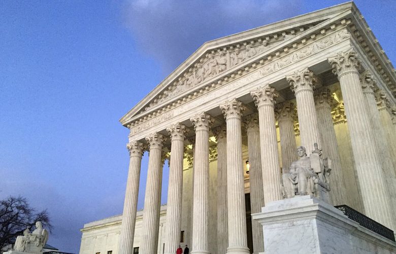 FILE – The Supreme Court at sunset in Washington, Feb. 13, 2016. (AP Photo/Jon Elswick, File) WX101 WX101