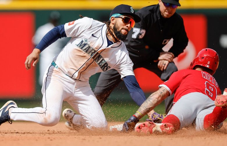 J.P. Crawford gets LA’s Zach Neto trying to steal in the sixth.  The Los Angeles Angels played the Seattle Mariners in Major League Baseball Wednesday, April 30, 2025 at T-Mobile Park, in Seattle, WA. 229851