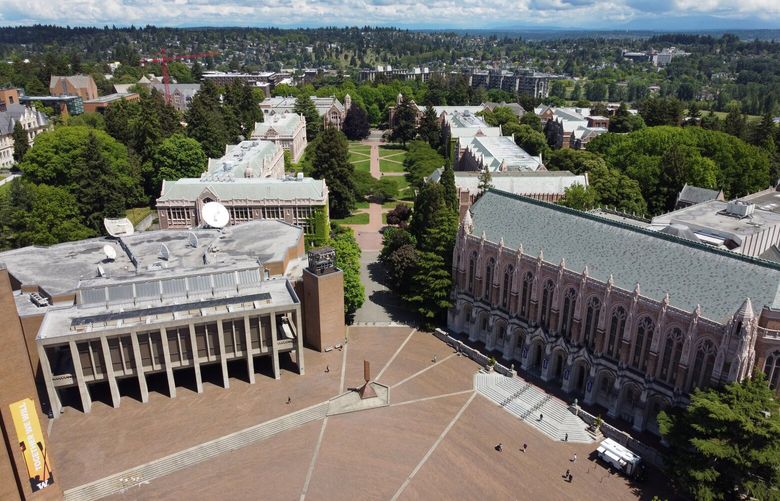 The University of Washington’s Red Square, with the quad in the background is seen from the air, Wednesday, May 19, 2021 in Seattle. Washington’s 6 public universities are going “test optional,” no longer requiring the SAT/ACT for admissions. 217185