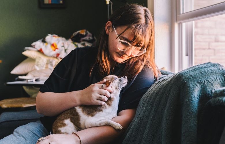 Ashley Palardy finds herself spending the most time after work relaxing and playing with her dogs. MUST CREDIT: Joseph Bui/For the Washington Post