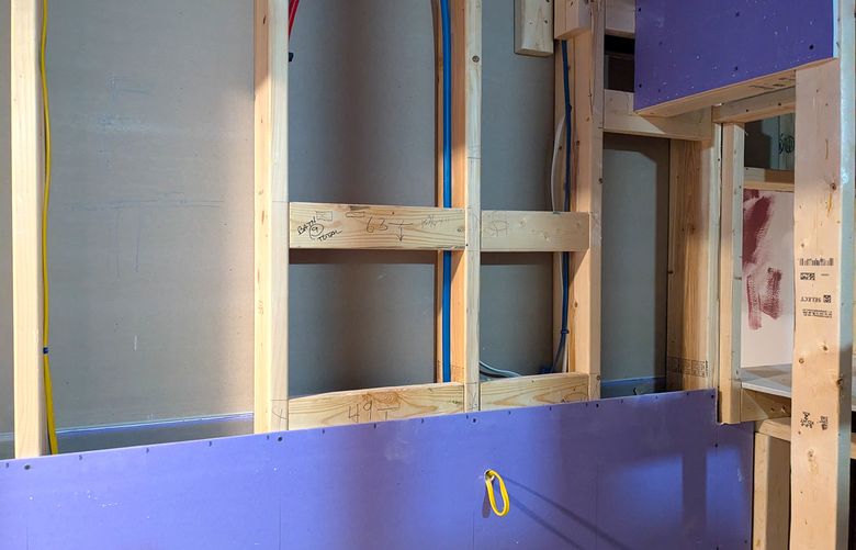 This is what typical interior wall construction looks like. Once the next sheet of drywall is added, the wall is not much different from a bass drum you