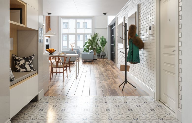 “Shoes and coats scattered in the entryway are a big ugh for me, so I’m always placing them on the shoe rack or hanging them up,” Solomon says. (Getty Images)