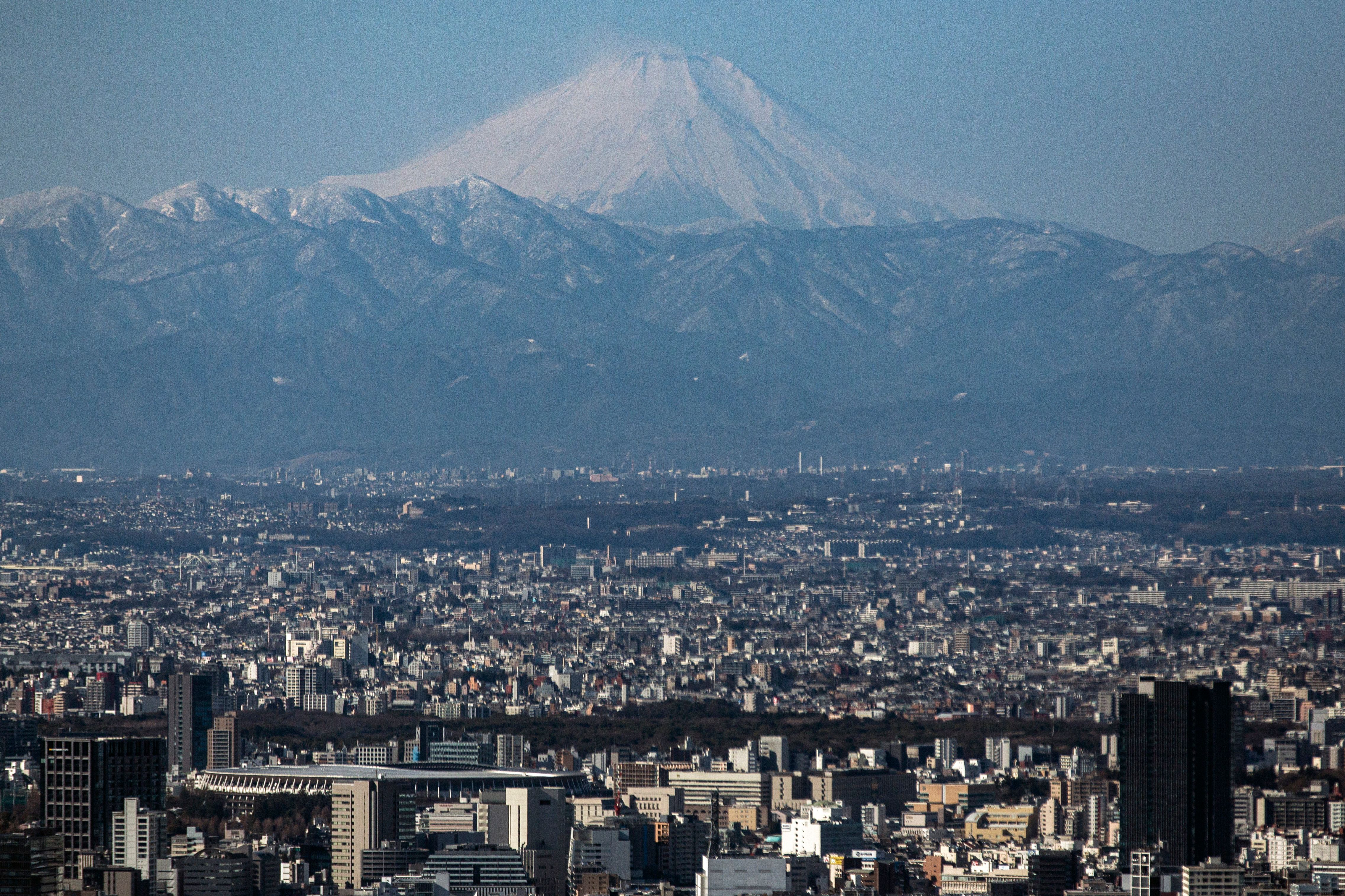 A man airlifted from Japan's Mount Fuji returns to the slope days