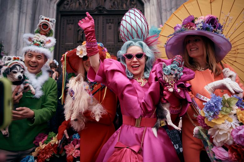 AP PHOTOS: Colorful hats and costumes light up annual NYC Easter Parade |  The Seattle Times
