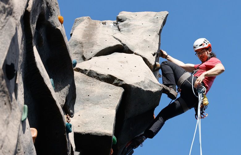 Jonathan Tinker from Kenmore practices lead rope soloing techniques on the climbing wall at the Mountaineers Seattle Program Center in Seattle on Saturday, March 29, 2025. Tinker is practicing climbing and belaying at the same time, as well as, falling. He’s been climbing for four or five years. “I really jumped into it,” he says of his experiences learning from friends and on his own.