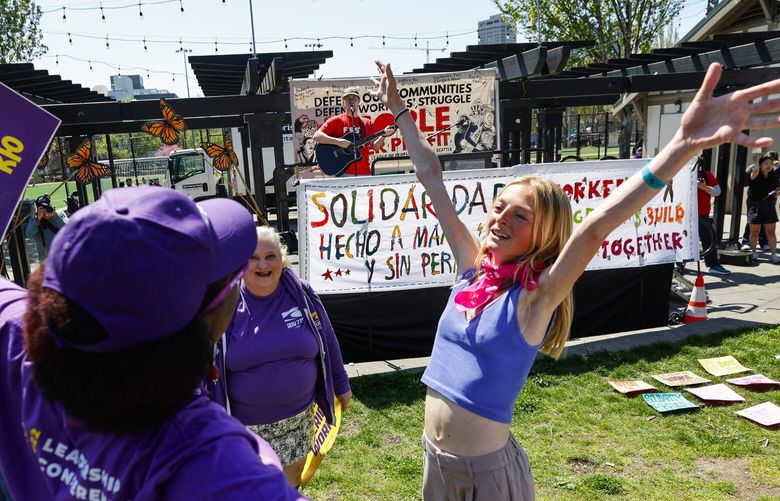 Labor, union and immigration rights groups participate in the May Day Rally and March beginning at Cal Anderson Park in Seattle on Thursday, May 1, 2025.