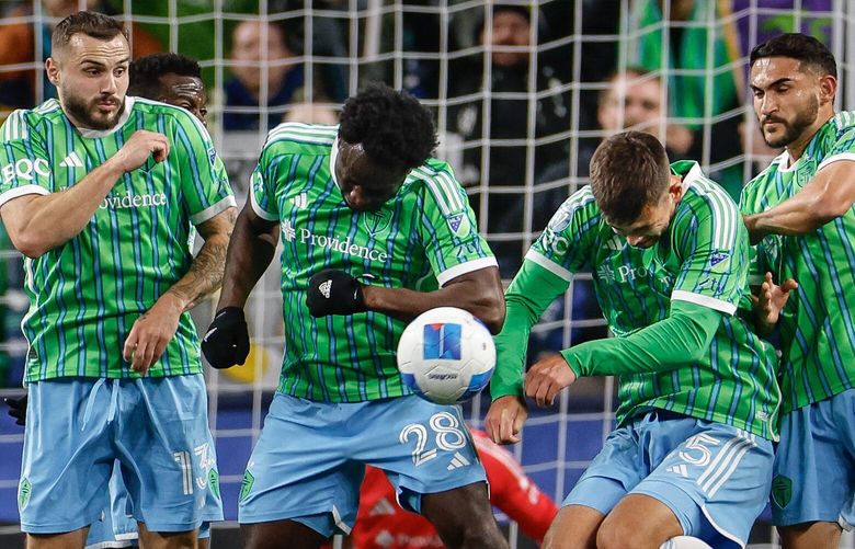 The Sounders defend a Cruz Azul free kick in the first half.  Cruz Azul of Mexico City played the Seattle Sounders FC in the second round of the CONCACAF Champions Cup Wednesday, March 5, 2025 at Lumen Field, in Seattle, WA. 229493