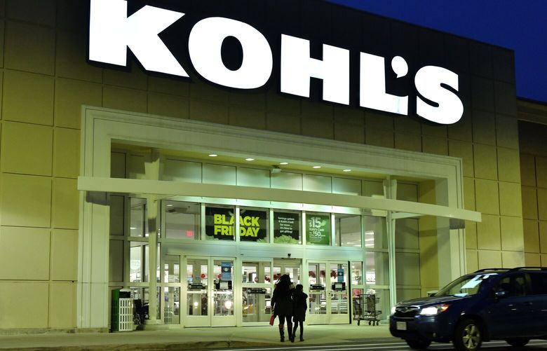FILE – A pair of shoppers arrive at a Kohl’s, Nov. 26, 2021, in Everett, Mass.  (AP Photo/Josh Reynolds, file) NYBZ411 NYBZ411