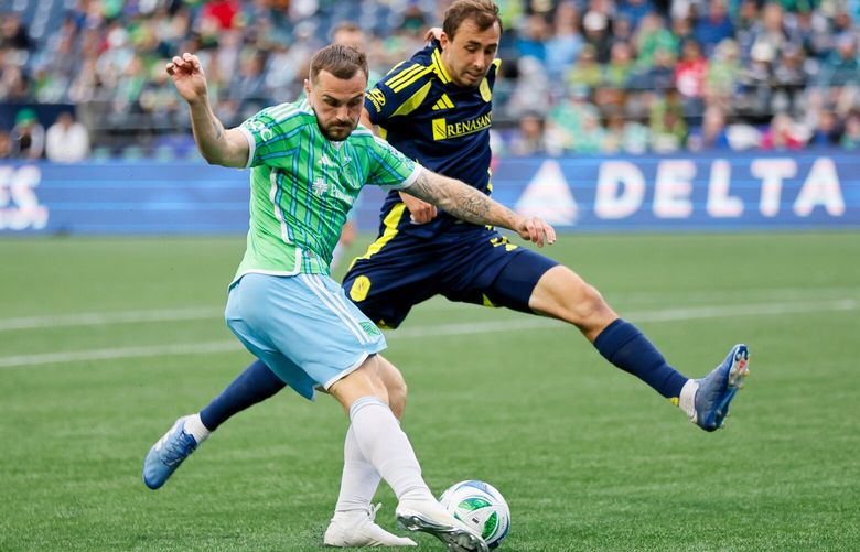 Nashville SC defender Jack Maher tries to block a cross by Seattle Sounders FC forward Jordan Morris during the second half Saturday, April 19, 2025 in Seattle. 229791