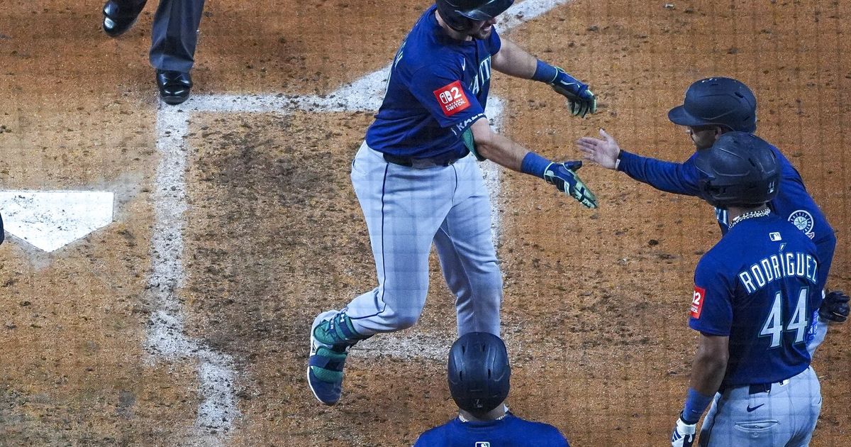 Cal Raleigh belts two more homers, Bryan Woo dominates in M's thrashing of ...