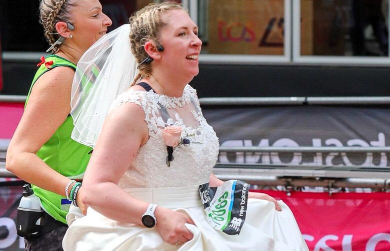 Laura Coleman-Day ran the last three miles of the London Marathon in her wedding dress. MUST CREDIT: Chloe Morgan