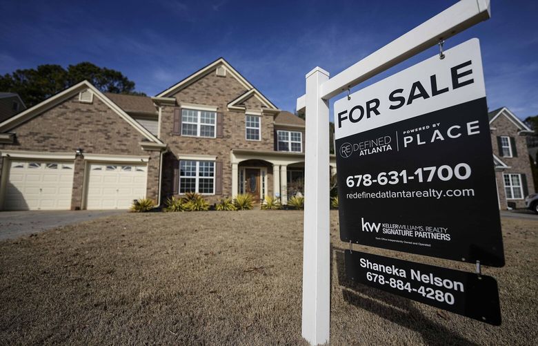 FILE – A sign announcing a home for sale is posted outside a home, Thursday, Feb. 1, 2024, in Aceworth, Ga., near Atlanta. (AP Photo/Mike Stewart, File) NYBZ421 NYBZ421