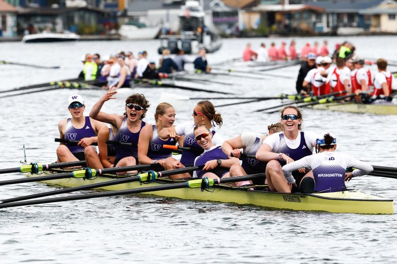 The UW Huskies women’s Varsity 8 react after winning the 39th annual Windermere Cup in Seattle on Saturday. (Karen Ducey / The Seattle Times)
