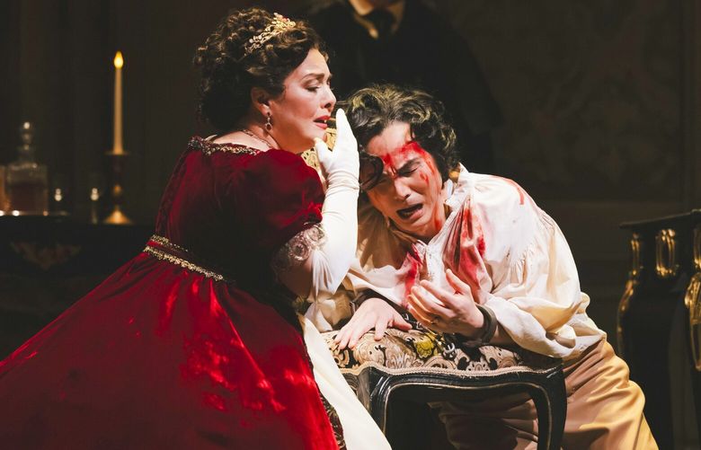 Lianna Haroutounian as Floria Tosca, left, and Yonghoon Lee as Mario Cavaradossi in Seattle Opera’s production of “Tosca.”